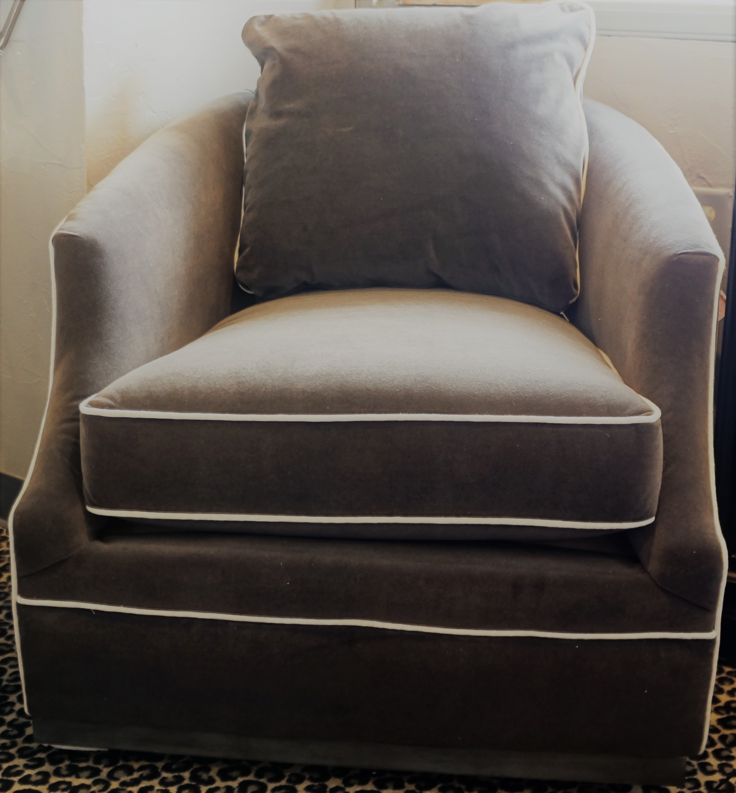 Gray Barrel Swivel Chair with Cream Piping Nuance